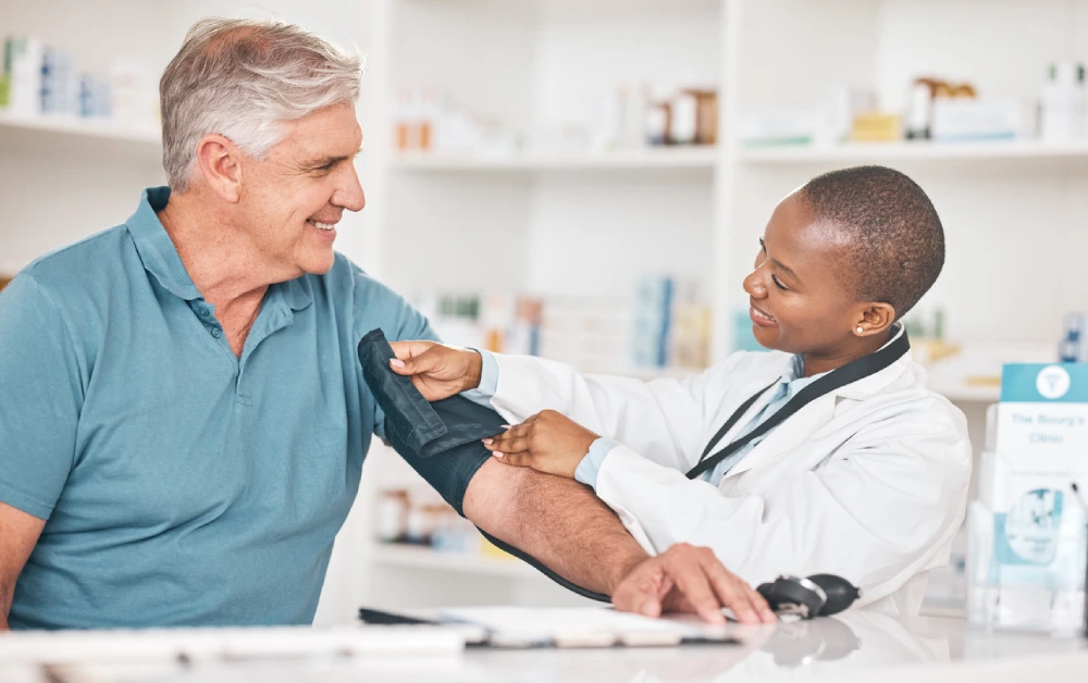 elderly man receiving care at a pharmacy care clinic