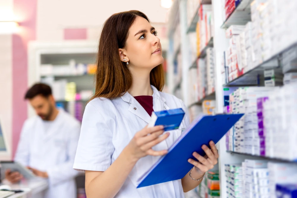 pharmacist taking inventory